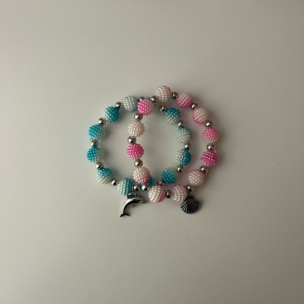 Pink and Blue Beaded Bracelets with Charms